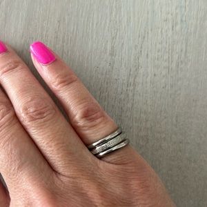 Set of 3 stacking silver looking steel rings. Size 5. One is eternity glitter